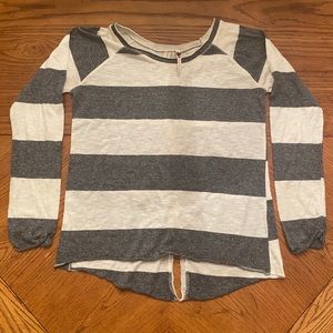 Grey and white striped shirt.